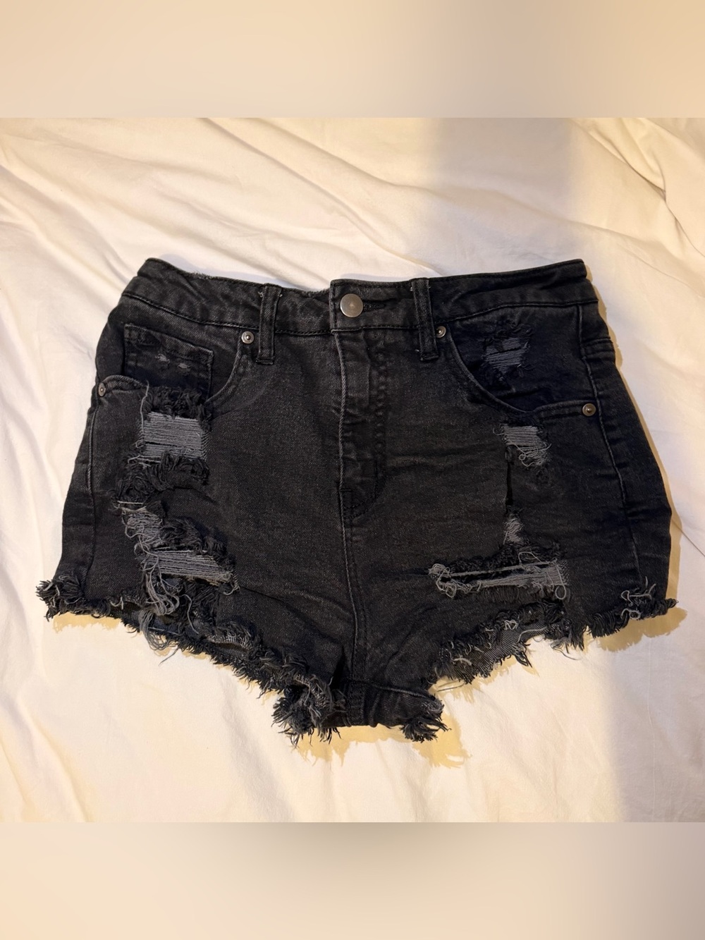 Black distressed shorts